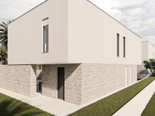 Minimalist architecture with stone base and clean