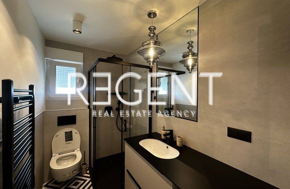 STAN - KMAN NAJAM0010